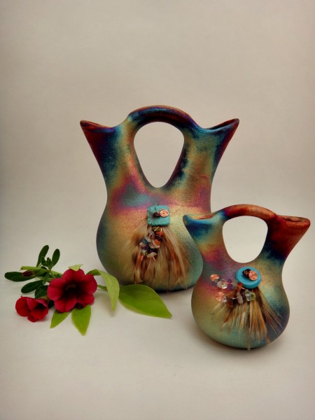 The Wedding Vase is an ancient vessel of traditional Native American wedding ceremonies. Spouts represent husband and wife, looped handle-unity of marriage.
